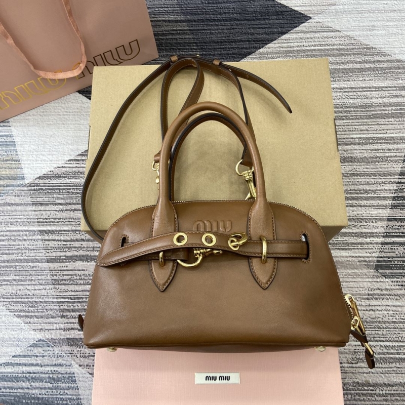 G*u*i top handle bags